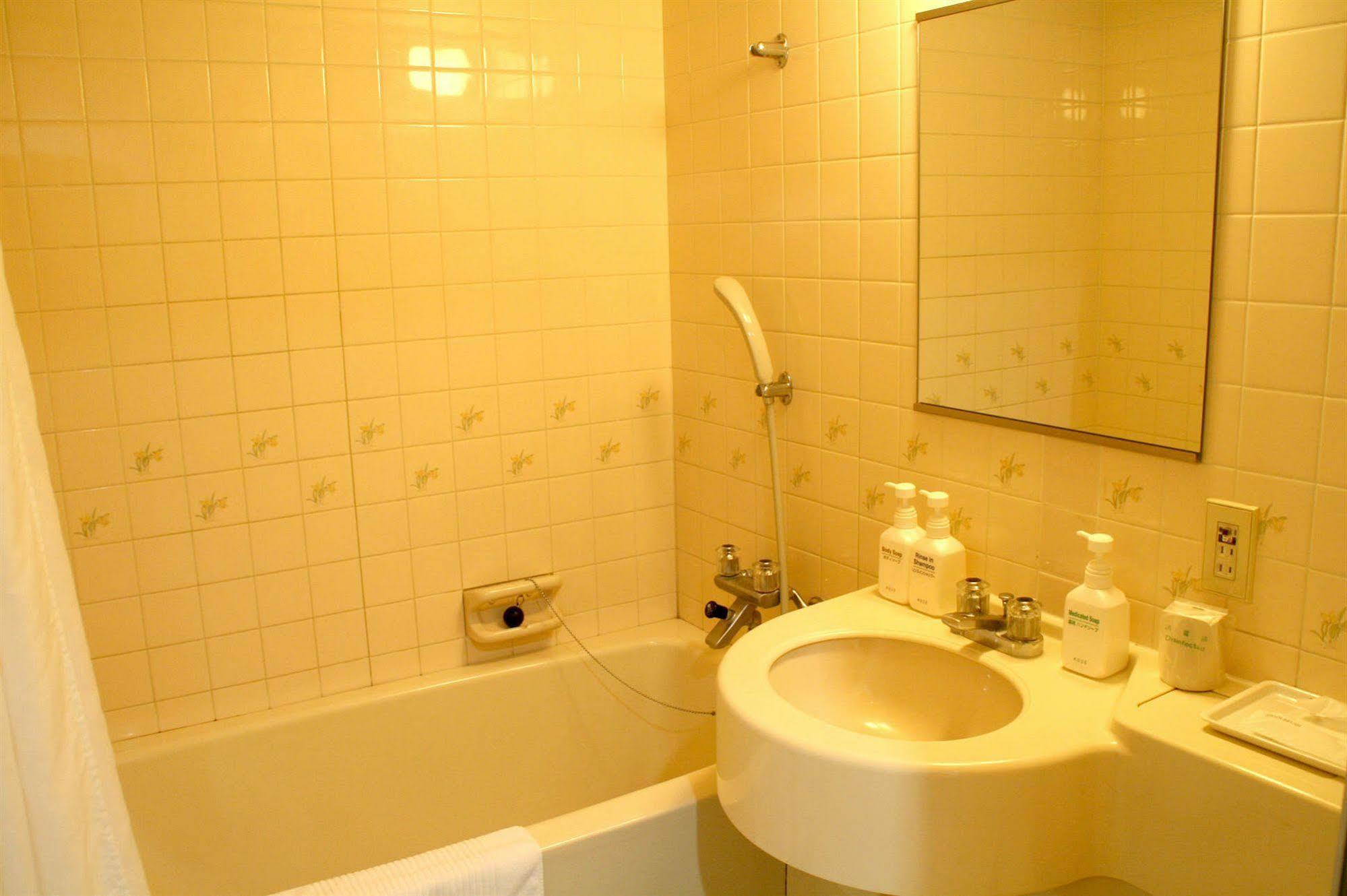 Green Hill Hotel Akashi Bagian luar foto